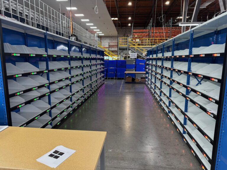 IntelliSort sort-to-light aisle with green and red location lights